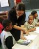 A teacher at P.S. 48 in Harlem works with students on reading skills (Richard B. Levine | Showcase) A teacher at P.S. 48 in Harlem works with students on reading skills (Richard B. Levine | Showcase)